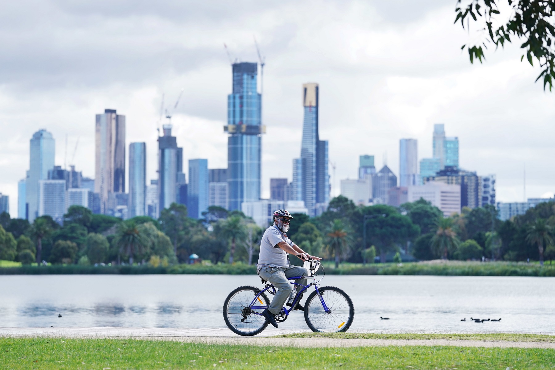 People exercise at Albert Park Lake in Melbourne.