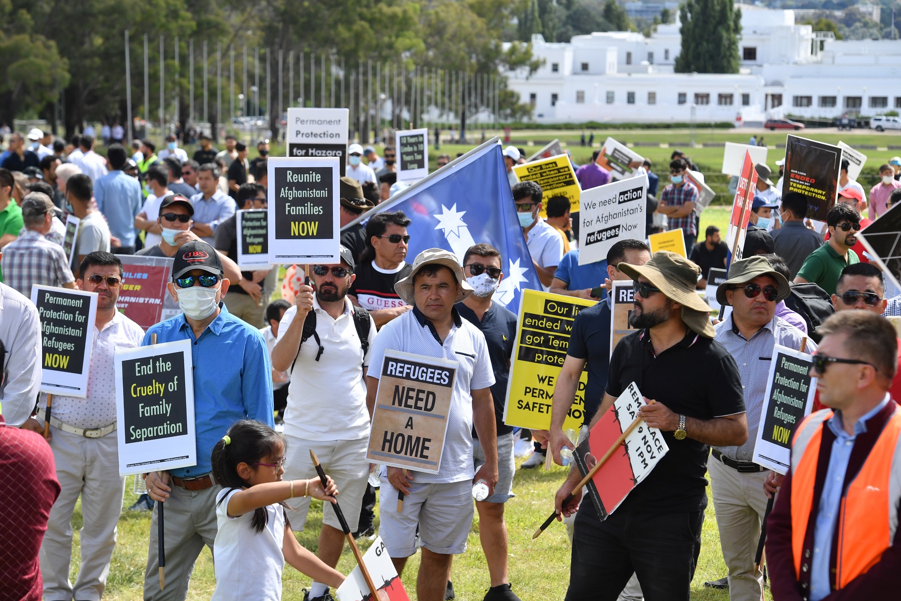 Refugees and people seeking asylum from Afghanistan rally ro protest outside Parliament House in Canberra, Tuesday, February 8, 2022. (AAP Image/Mick Tsikas) NO ARCHIVING