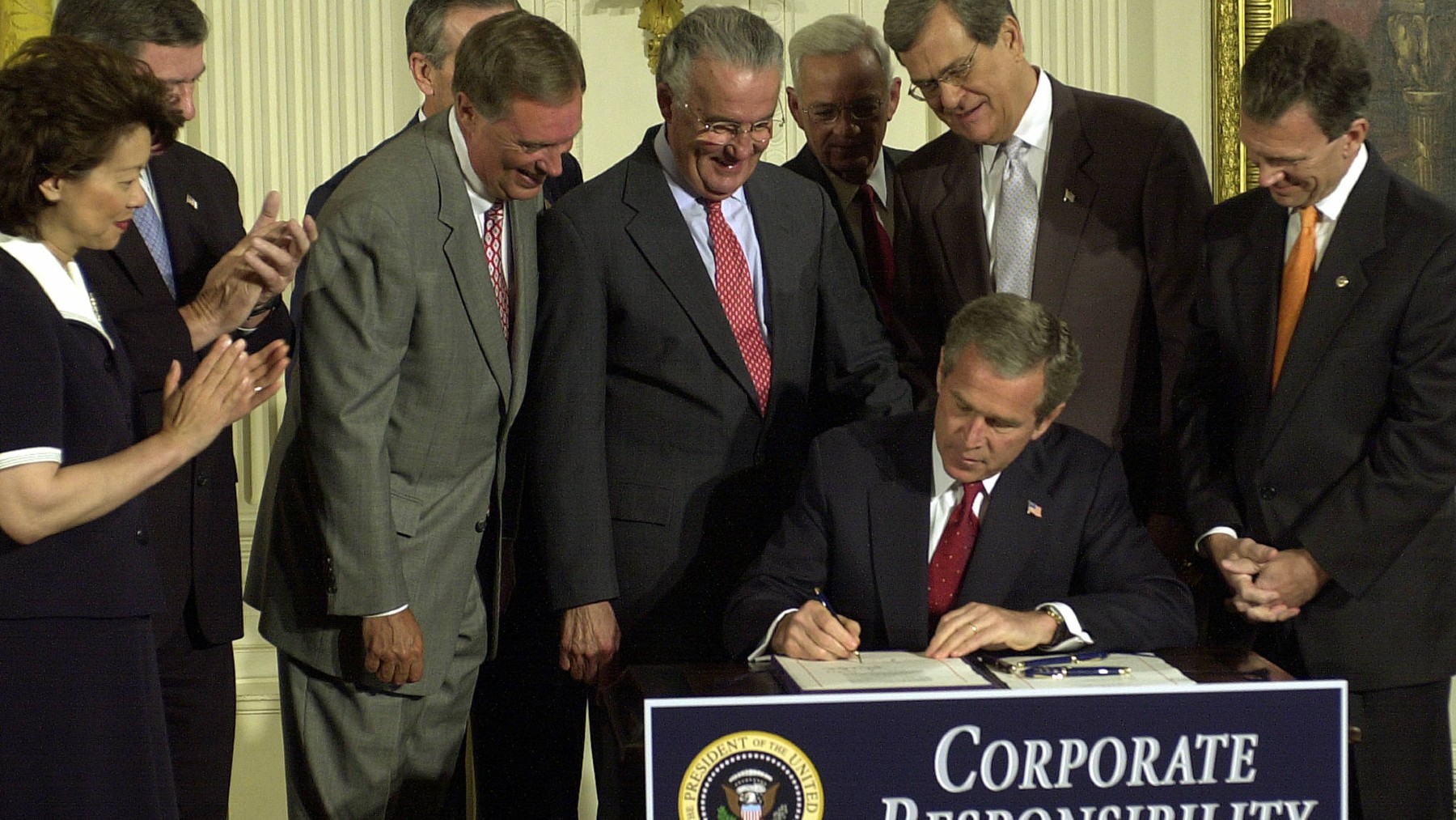 US President George W. Bush and Senator Paul Sarbanes (Centre) 