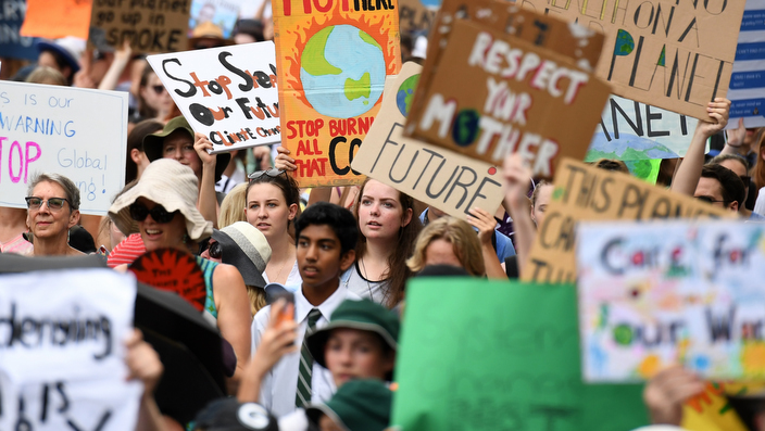 School students take part in a climate change strike in Brisbane, Friday, March 16, 2019. The strike is part of a global campaign to call for urgent action on climate change. (AAP Image/Dan Peled) NO ARCHIVING