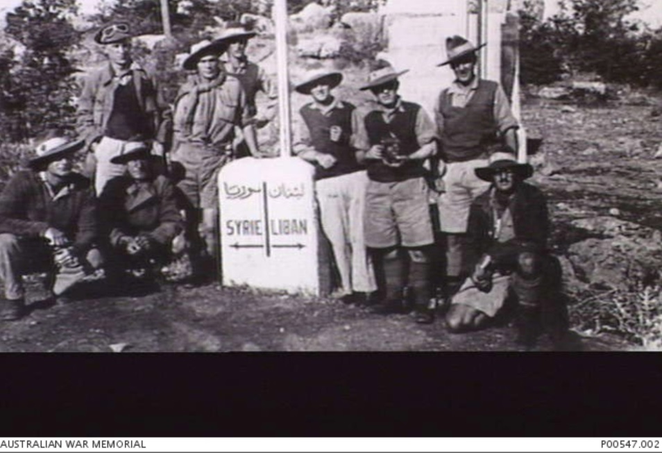 Syrian border. Group photo of members of the 2/6th Australian field company Sergeant Raymond Alexander OGG, first on the left in the front row.