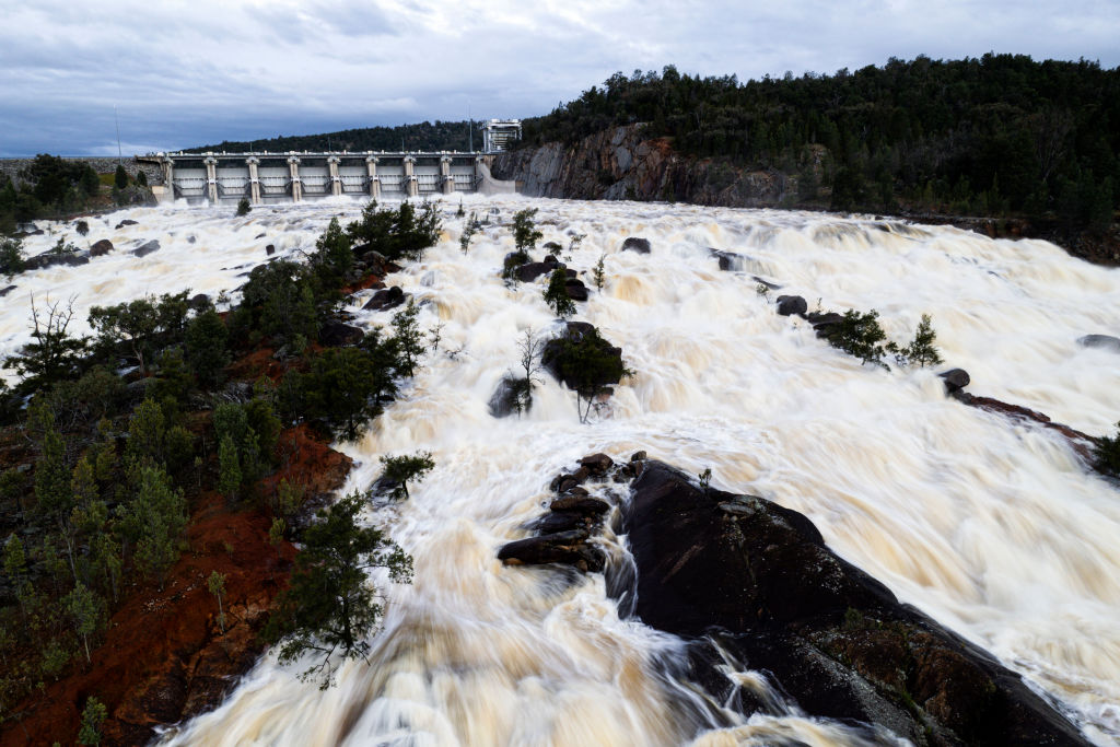 Fast flowing white waters from a dam 